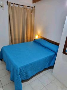 Giường trong phòng chung tại El mirasol