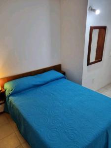 Giường trong phòng chung tại El mirasol