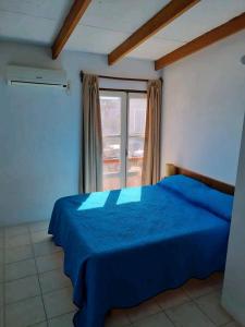 Giường trong phòng chung tại El mirasol