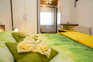 Katil atau katil-katil dalam bilik di Accommodation Resman