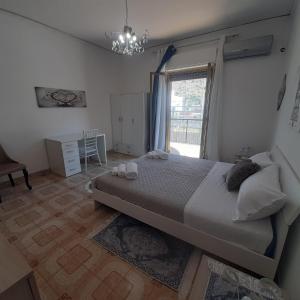 Ένα ή περισσότερα κρεβάτια σε δωμάτιο στο rossy guest house +13 φωτογραφίες