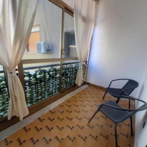 Χώρος καθιστικού στο rossy guest house