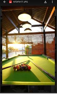 a pool table with balls on top of it at Villa Amanda 2 - Sea view - Private swimming pool 70 M2 in Mui Ne