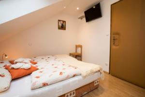 Katil atau katil-katil dalam bilik di Accommodation Resman