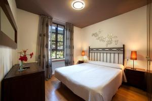 A bed or beds in a room at Eth Palai