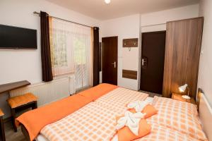Katil atau katil-katil dalam bilik di Accommodation Resman