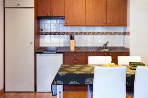 A kitchen or kitchenette at Eth Palai