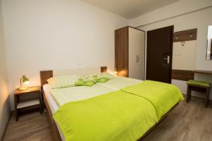 Katil atau katil-katil dalam bilik di Accommodation Resman