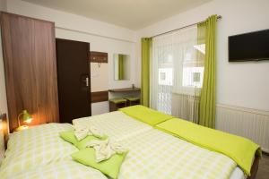 Katil atau katil-katil dalam bilik di Accommodation Resman