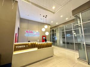 a lobby with aindersforceindersforce train station with a sign at Heart of CDO Scenic View in Cagayan de Oro +33 photos