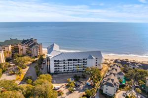 an aerial view of a hotel and the beach at Seascape 315 - Oceanfront Condo Overlooking Pool in Isle of Palms