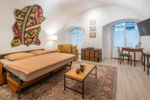 Ένα ή περισσότερα κρεβάτια σε δωμάτιο στο Altes Salzgewölbe Badgasse