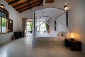 Φωτογραφία από το άλμπουμ του Villa by the River in Ambalangoda-Starflower Villa σε Ambalangoda