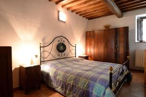 Postel nebo postele na pokoji v ubytování Agriturismo Le Cerinaie + 93 fotografií