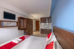 Ένα ή περισσότερα κρεβάτια σε δωμάτιο στο Dancenter Comfort Residence