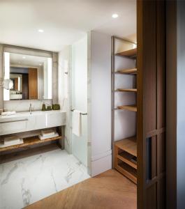 a bathroom with a sink and a mirror at Hyatt Regency Zadar in Zadar