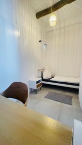 Ένα ή περισσότερα κρεβάτια σε δωμάτιο στο Ewelinas Loft