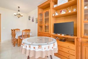 TV a/nebo společenská místnost v ubytování Ático en Torrox costa