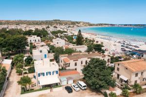 an aerial view of a town with a beach at Spuma di Mare - Riccio in San Vito lo Capo