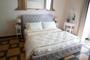 Postel nebo postele na pokoji v ubytování Lucca Relais
