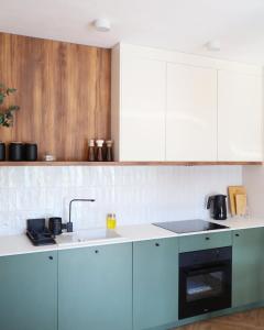 Η κουζίνα ή μικρή κουζίνα στο ZenApart - apartament z parkingiem