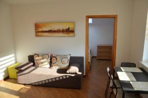 Ένα ή περισσότερα κρεβάτια σε δωμάτιο στο Apartamenty Milówka Centrum