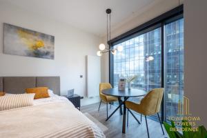 En eller flere senge i et værelse på Towarowa Towers Suites + 130 billeder