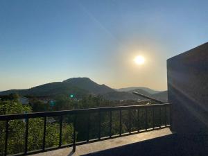 a view of the mountains from a balcony at Deka apartments 7 in Fethiye +6 photos