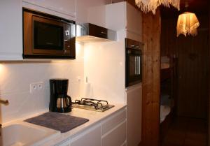 Η κουζίνα ή μικρή κουζίνα στο Le Chalet de Marie n°1