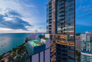 an aerial view of a tall building overlooking the ocean at Sea View High Floor - Breathtaking Views in Pattaya South