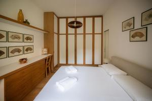 Katil atau katil-katil dalam bilik di Two-room apartment 450 meters from Gelsomini M4