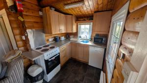 an overhead view of a kitchen in a log cabin at Eryri Retreat in Trawsfynydd +12 photos