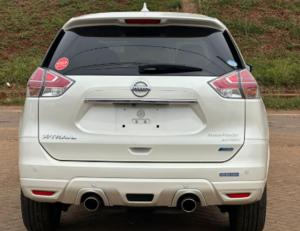 a white car is parked on the road at RunSafe Rental in Nadi
