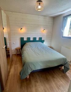 Postel nebo postele na pokoji v ubytování Appartement vue mer avec accès direct à la plage