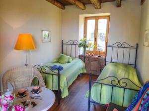 Ένα ή περισσότερα κρεβάτια σε δωμάτιο στο Casa Bureglio