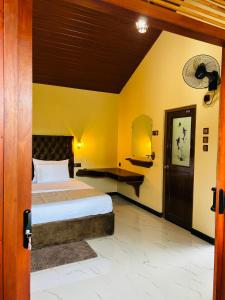 Voodi või voodid majutusasutuse Lush Green Cottage Ella toas