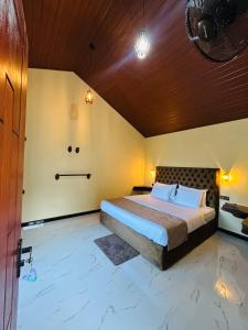 Voodi või voodid majutusasutuse Lush Green Cottage Ella toas