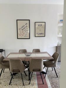 a dining room with a table and chairs at Katie's House in Sparti +19 photos