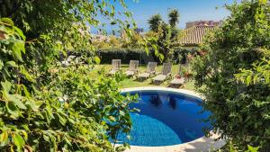 Kolam renang di atau dekat dengan Villa with private pool, garden and cinema REMS