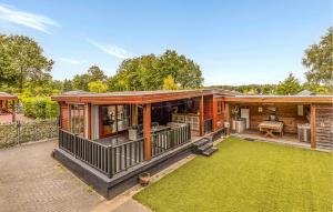 a house with a large deck and a yard at Cozy Home In Erm With Wifi in Erm