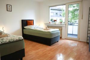 Ένα ή περισσότερα κρεβάτια σε δωμάτιο στο ZecheLoft by Linus - Place22 +23 φωτογραφίες