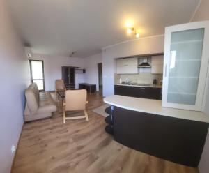 Kuchyň nebo kuchyňský kout v ubytování Apartament Lea