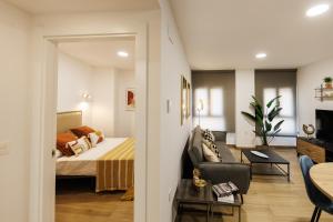 Μια τηλεόραση ή/και κέντρο ψυχαγωγίας στο Marwan Apartamentos Turísticos