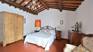 Postel nebo postele na pokoji v ubytování Aia di Ama + 24 fotografií