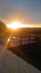 a sunset from the roof of a building at Le Domaine de Camberoux La Petite Longère in Saint-Marcel-du-Périgord