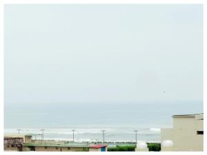 a view of a city with buildings and the sky at Sea Beach Hotel Room with Balconies, Restaurant, Parking & Free Wi-Fi ,Beach Front Location - Fully Air Condition with All Luxury Luxuary Rooms, A Top Rated Hotel In Puri in Puri