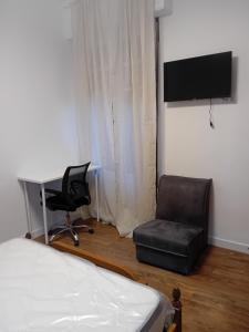 Et tv og/eller underholdning på Habitación Puerta del Carmen