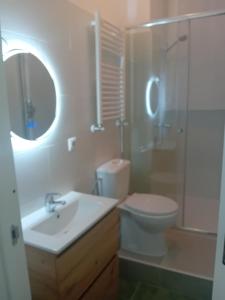 Et badeværelse på Habitación Puerta del Carmen