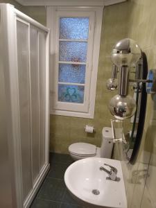 Et badeværelse på Habitación Puerta del Carmen