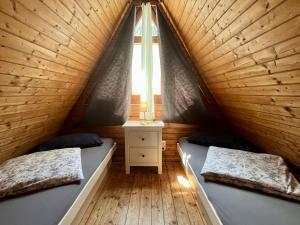 Ένα ή περισσότερα κρεβάτια σε δωμάτιο στο Holiday Home Ferienhäusle Nina by Interhome